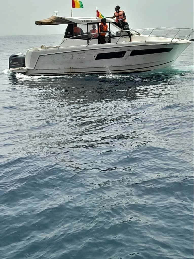 Transfer launch at sea, crew in life jackets